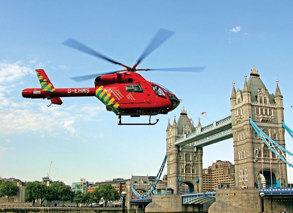 MD Explorer 902 helicopter airborne near Tower of London 