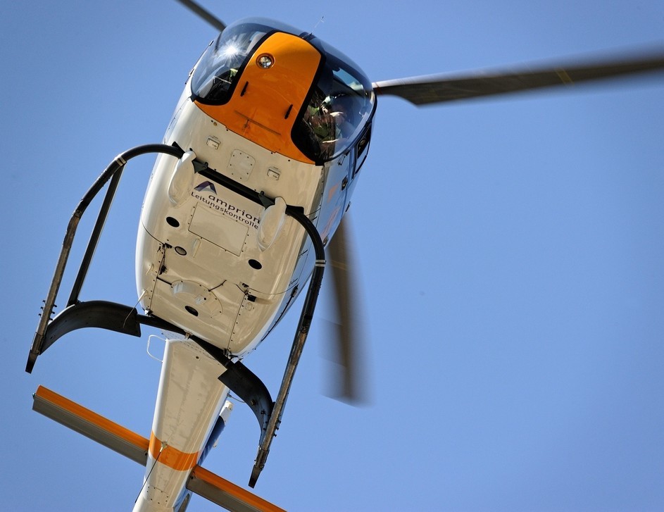 Helicopter equipped for aerial inspection of power lines