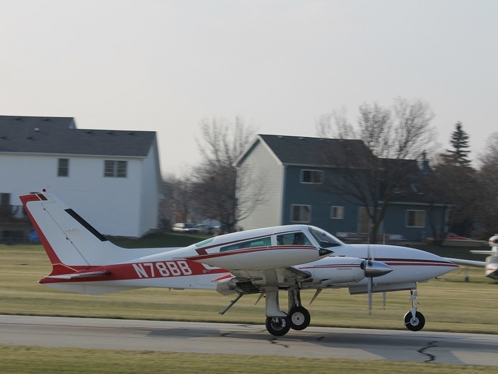 An N-registered twin piston Cessna 310 at the local airfield