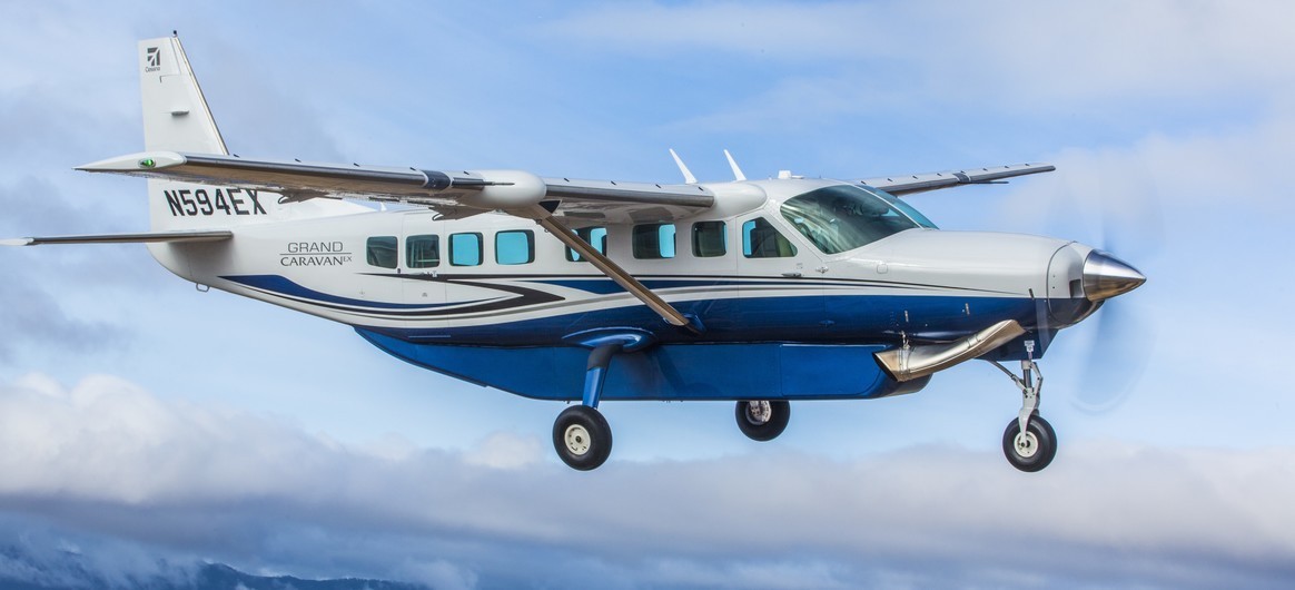 Cessna Grand Caravan EX Flying over mountains