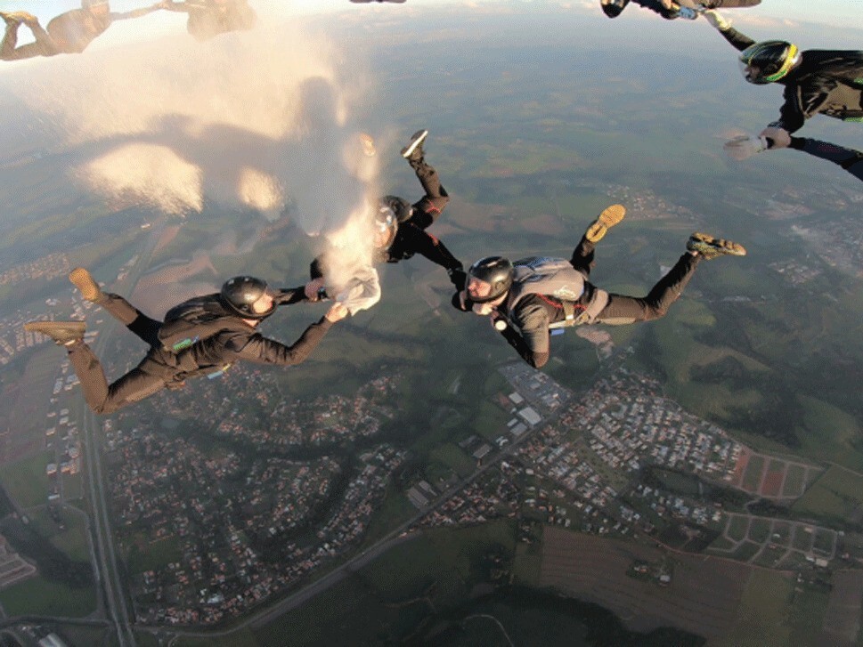 skydivers scattering ashes