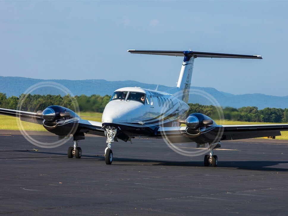 Beechcraft King Air 260 twin-engine turboprop taxis to the runway