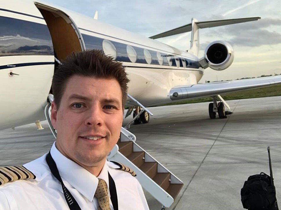 Jeff Coursey standing outside a Gulfstream G550